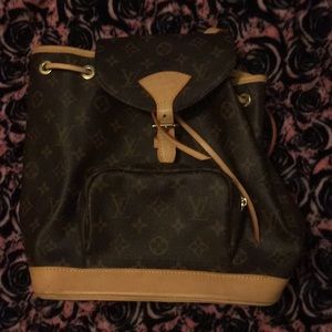 Luis Vuitton signature mm backpack montesouris